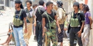 الصورة لمقاتلين من المقاومة الشعبية في تعز